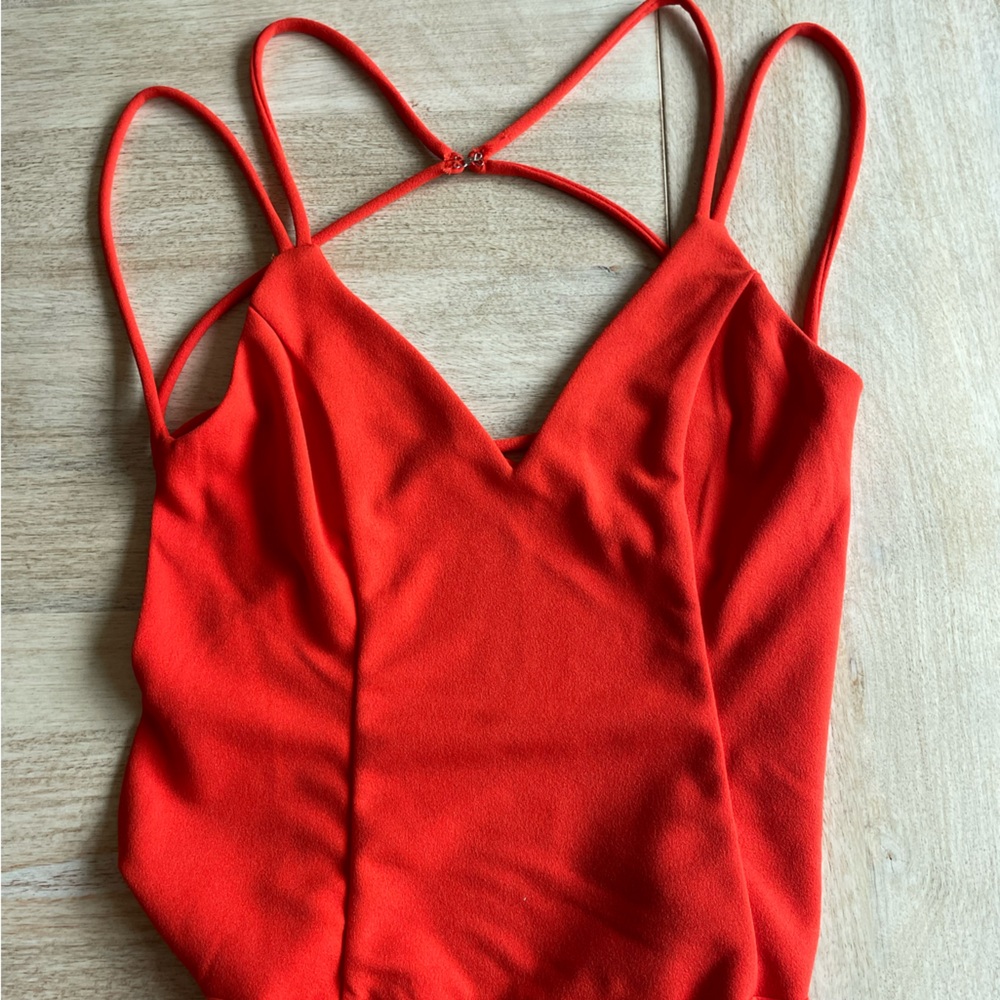 Lulu’s Vibrant Red Hot Strappy Bodysuit